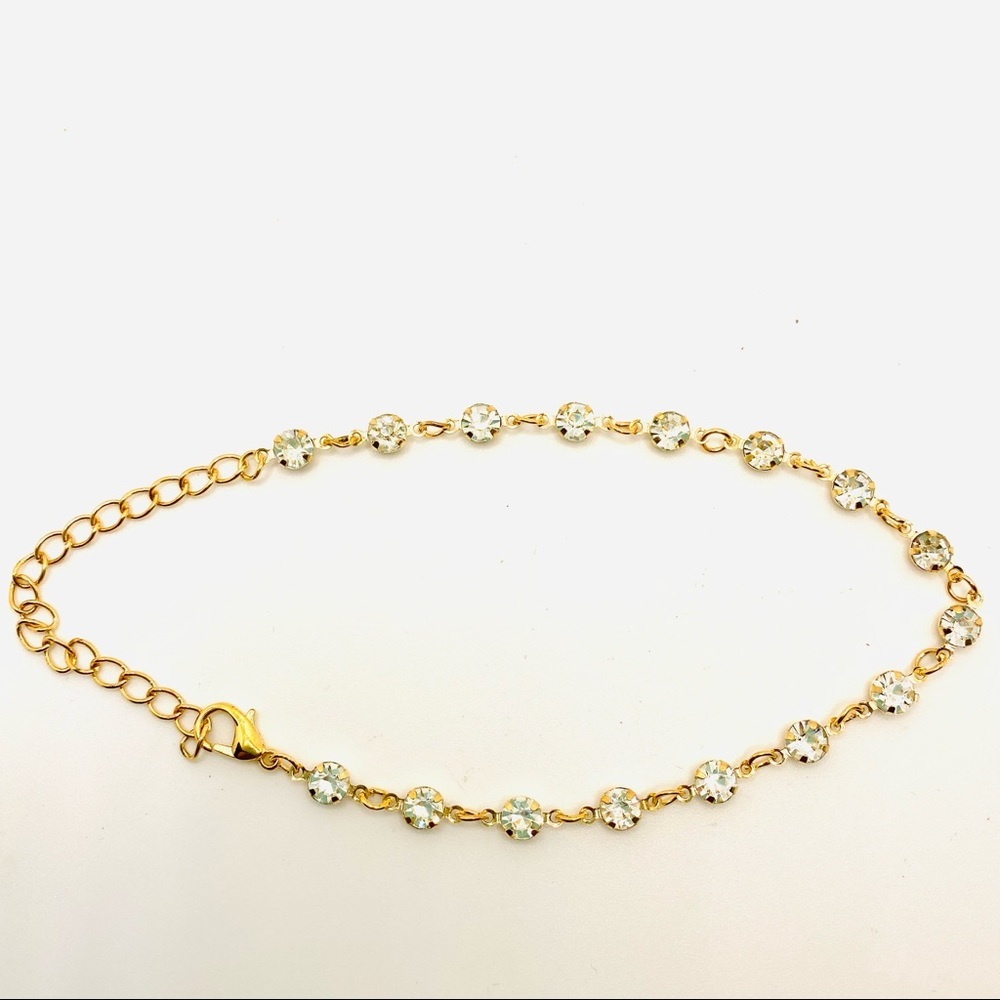Anklet Crystals set in golden tone.